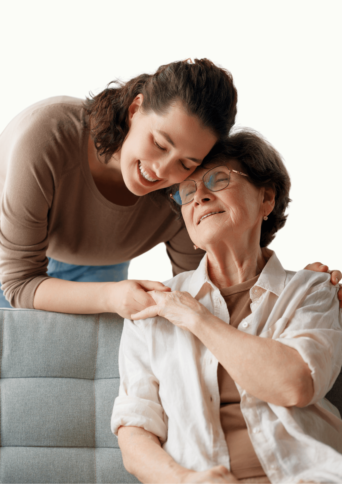 A woman leaning in and smiling with an older family member at home
